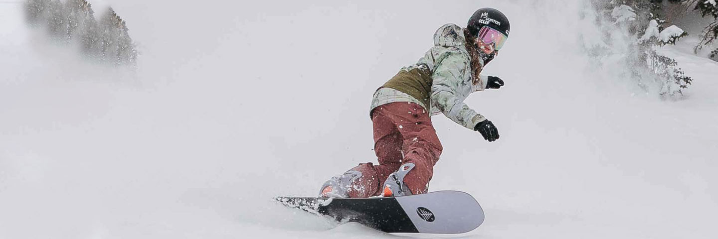 A woman snowboarding